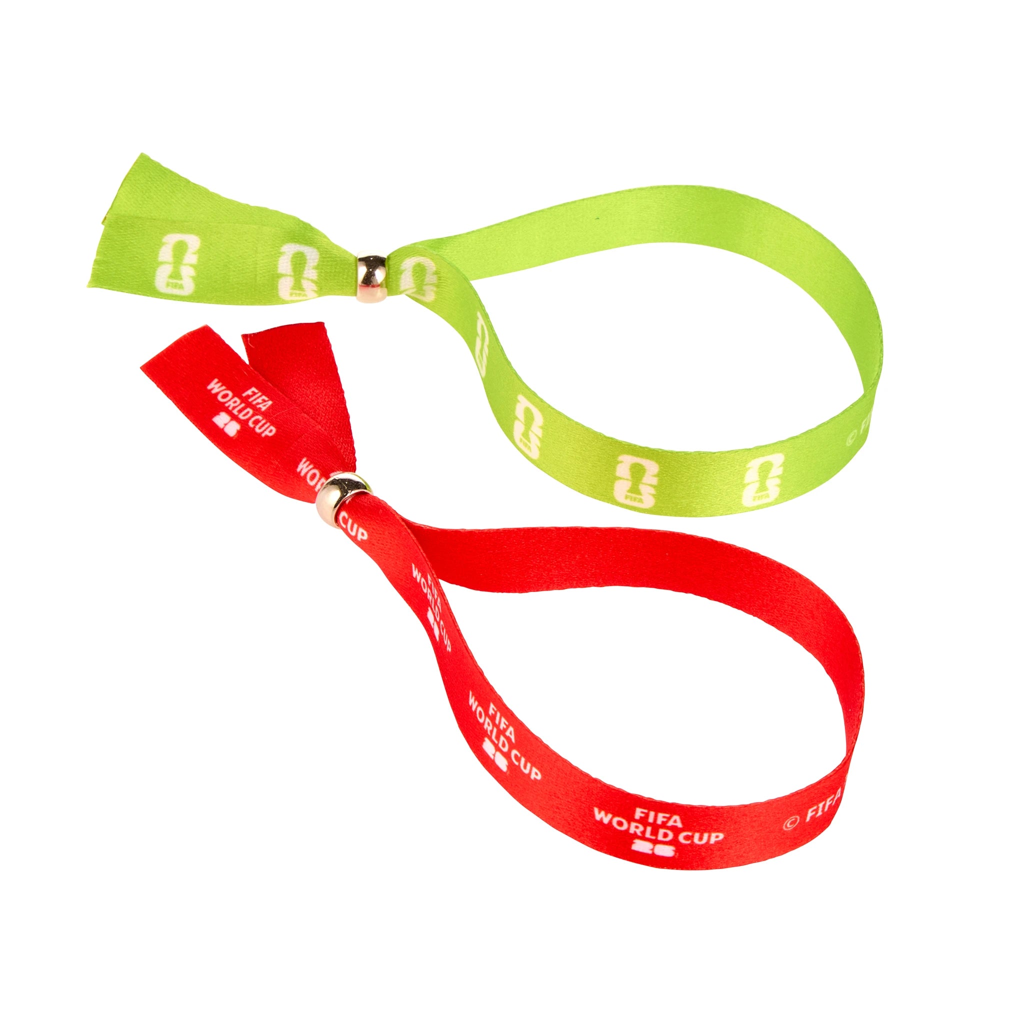 Two wristbands, one red and one green, with 'FIFA World Cup' text on a white background.